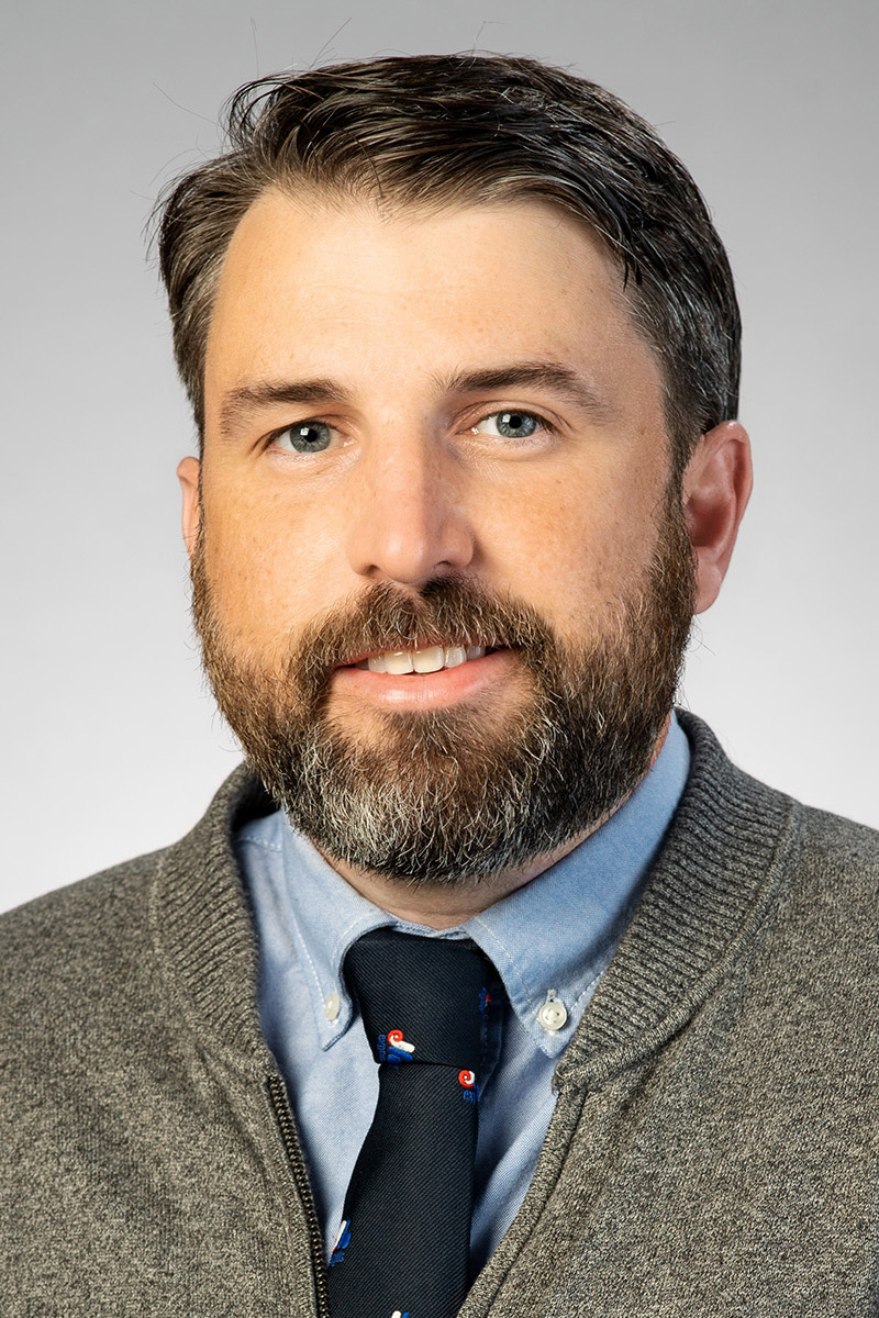 Adam Mackie's headshot